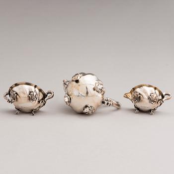 A silver sugar tong and a 3-piece silver coffee set, mark of Juho H. Pekuri, Oulu 1931 and Finnish import marks 1938.