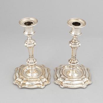 A pair of silver candlesticks, mark of William Hutton & Sons Ltd, London 1900.