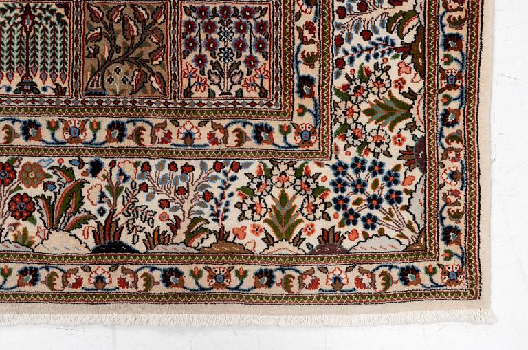 A Moud carpet, part silk, approx. 285 x 195 cm.
