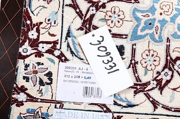 A carpet, Nain, part silk, 6 Laa, ca 312 x 208 cm.
