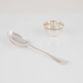 A Swedish 18th century silver tumbler and a silver spoon, mark of Erik Granroth, Sala 1744 and 1748,