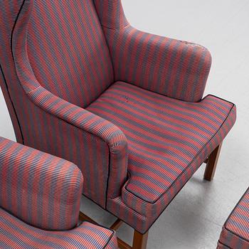 Kaare Klint, a pair of model 6212 armchairs with ottomans, Rud Rasmussen, Denmark.