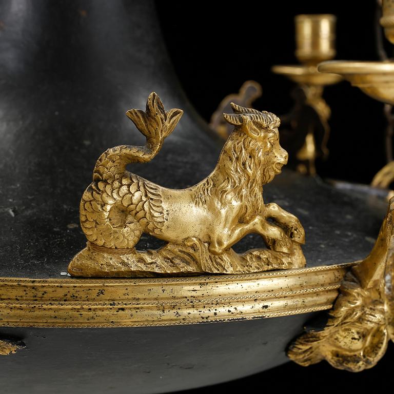 An Empire early 19th century nine-light hanging lamp.