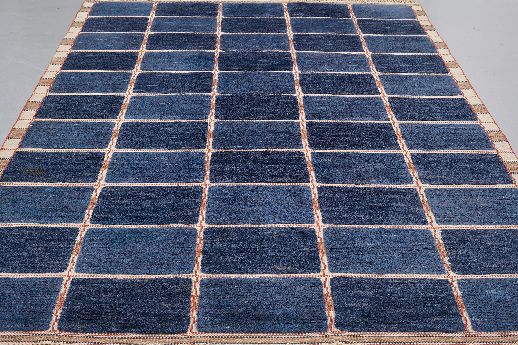 Märta Måås-Fjetterström, A CARPET, "Rutig blå halvflossa", knotted pile in relief, ca 304 x 209,5 cm, signed AB MMF.