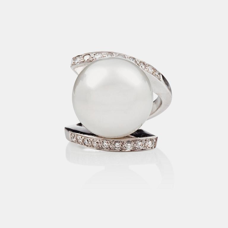 A cultured South sea pearl and brilliant-cut diamond ring. Total carat weight of diamonds circa 1.50 cts.