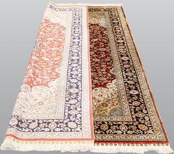 An oriental silk carpet, ca 246 x 155 cm.