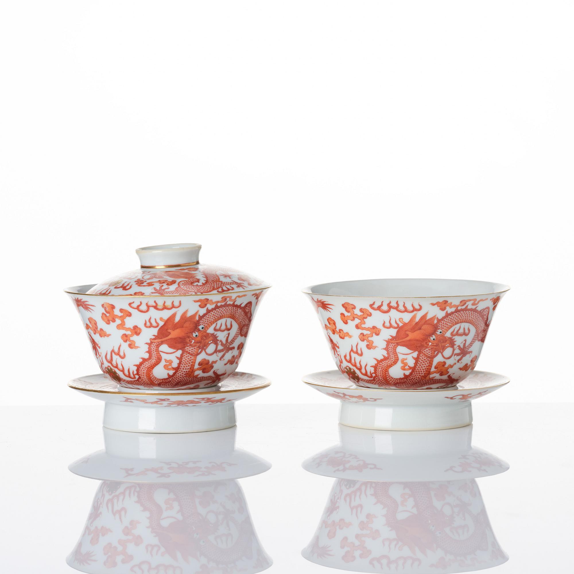A pair of five clawed dragon bowls on stands and a cover, Qing dynasty, Daoguang mark and period (1821-50).