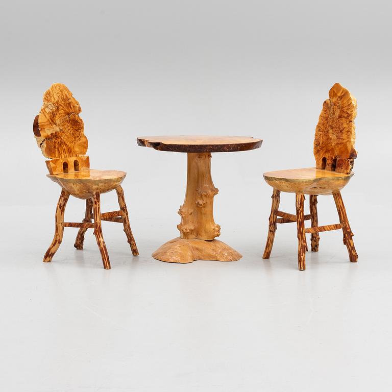 A burl table and a pair of burl chairs, Sweden, 20th century.