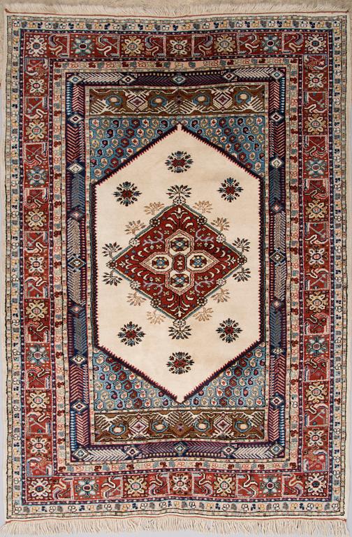 A rug from Kula, old. Circa 246x171 cm.