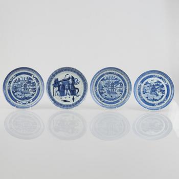A group of four Chinese blue and white plates, late Qing dynasty / early 20th century.