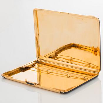 Cartier Art Deco cigarettetui 18K guld med svart emalj och safirer.