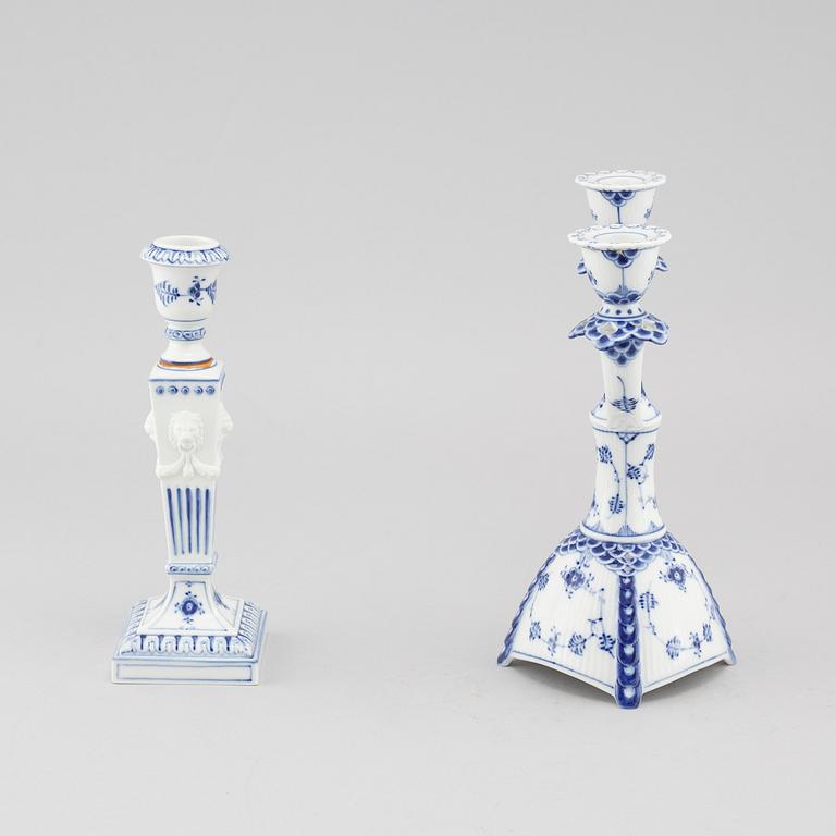 A porcelain candelabra and a candlestick from Royal Copenhagen, model "Musselmalet", 20th century.