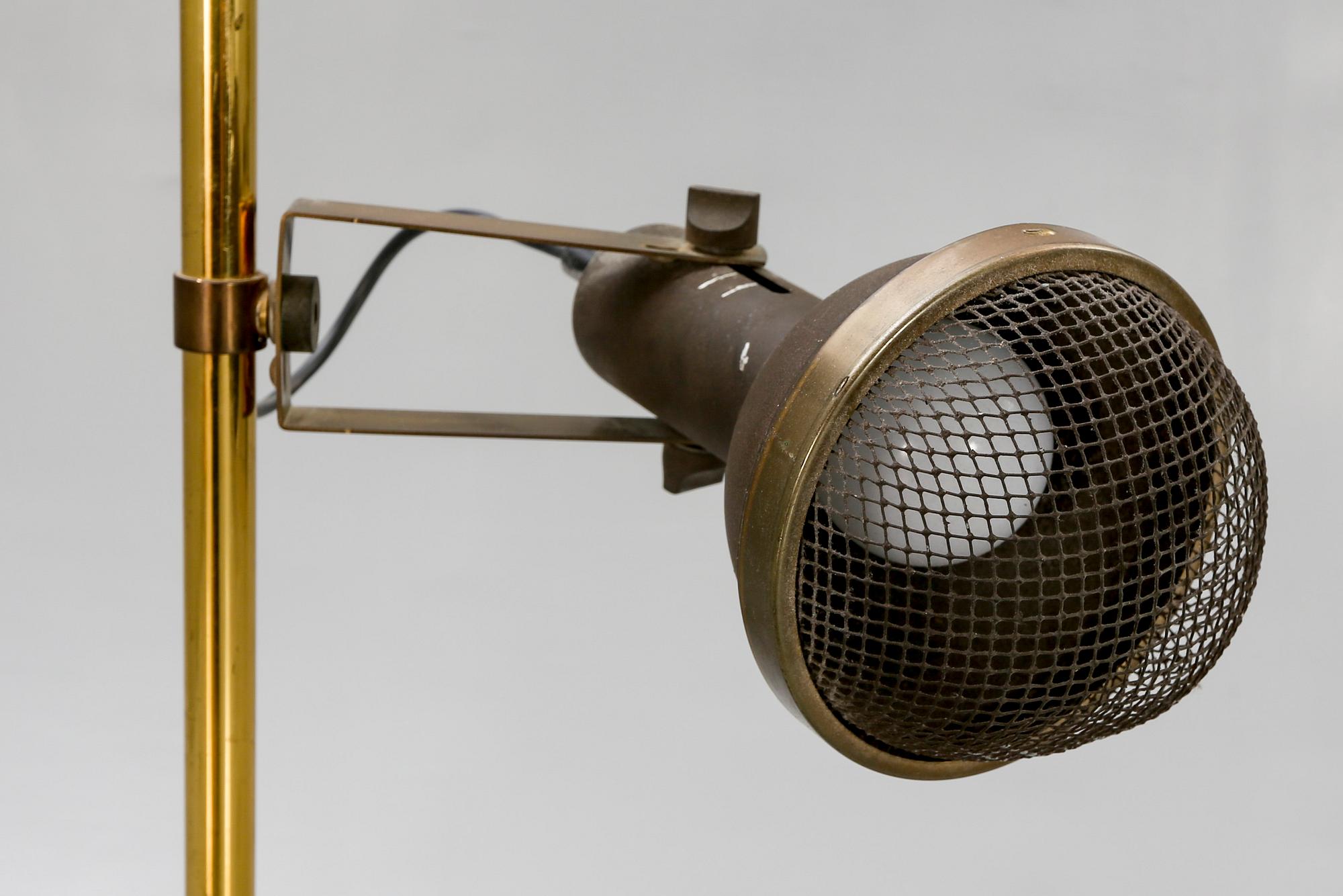 A late 20th century brass floor lamp.