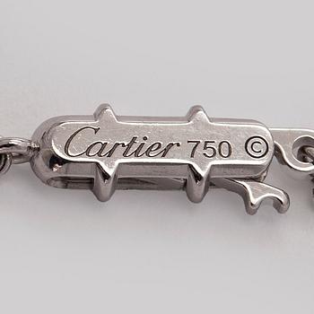 Cartier, an 18K white gold '1895' necklace with a brilliant-cut diamond.