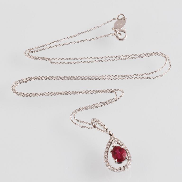 HÄNGE, 18K vitguld med fasettslipad rubin ca 0.87 ct samt briljantslipade diamanter ca 0.23 ct. Vikt 2,6 gram.