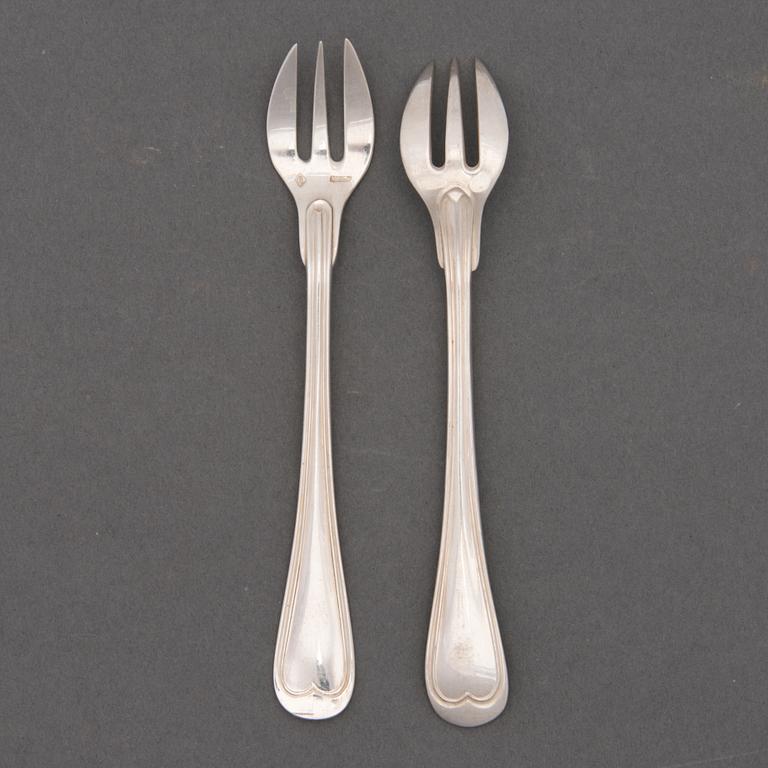 A SET OF 12 OYSTER FORKS, plate. Miele & Co.