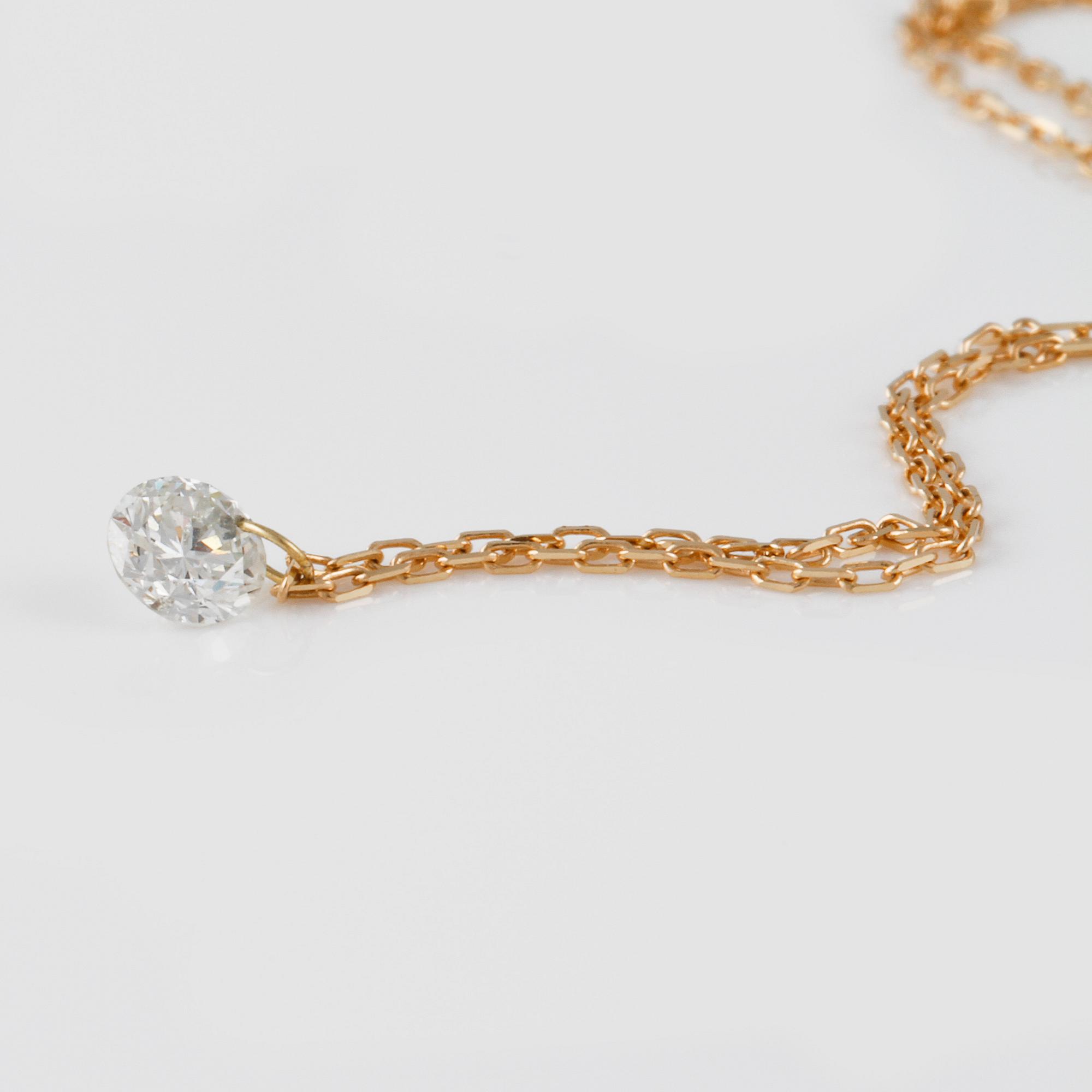HÄNGE, 18K guld med briljantslipad diamant 0.20 ct. Vikt 1,0 gram.