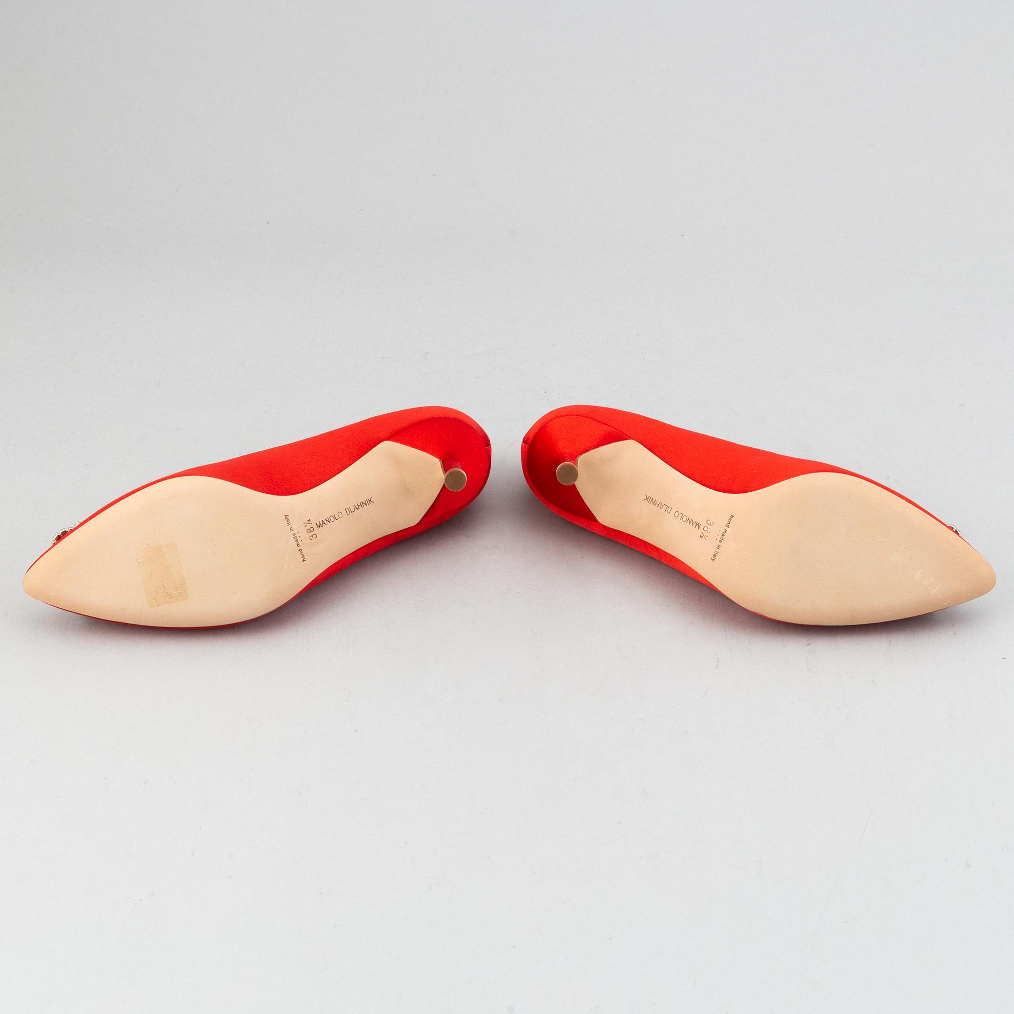 Manolo Blahnik, a pair of red satin 'Hangisi' shoes, 2020, size 38½.