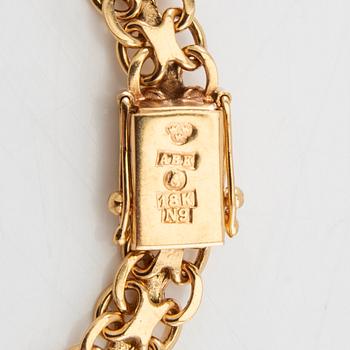 Bracelet X-link 18K gold.