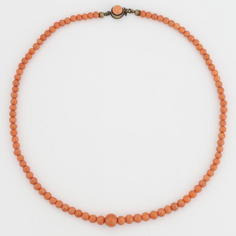 Coral bead necklace.