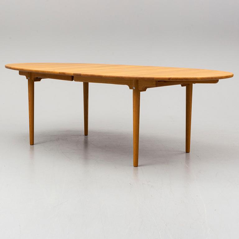 HANS J WEGNER, a oak dining table model CH339, Carl Hansen & Son, Denmark.