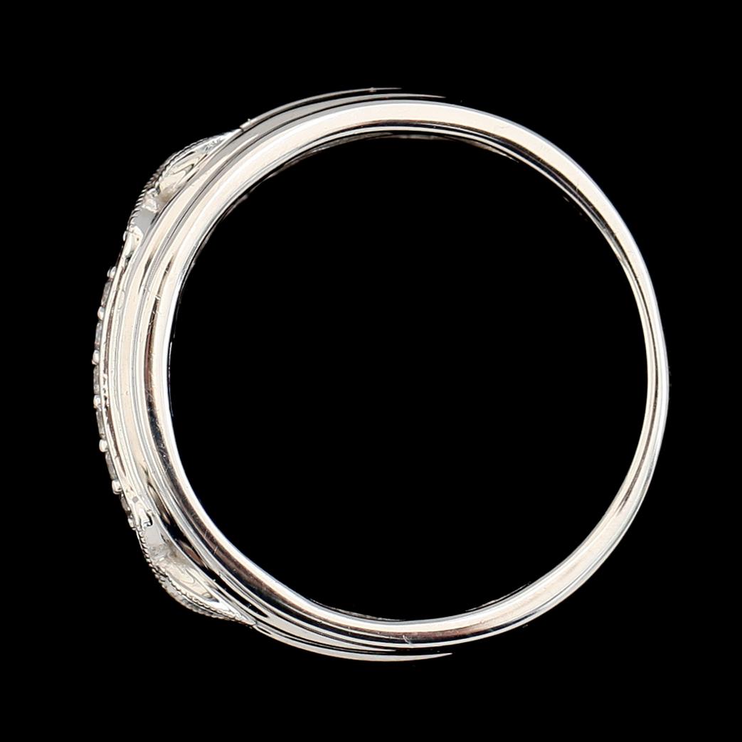 RING, 10K vitguld, briljantslipade diamanter tot ca 0.06 ct. Vikt ca 4 g.