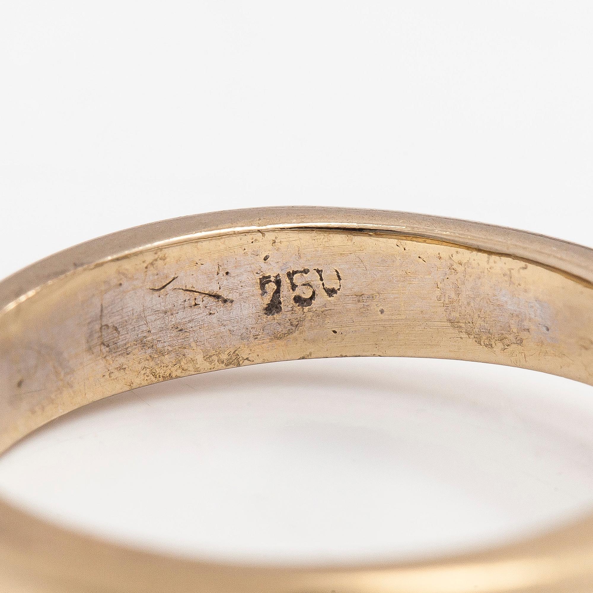 Ring, 18K guld med en briljantslipad diamant.