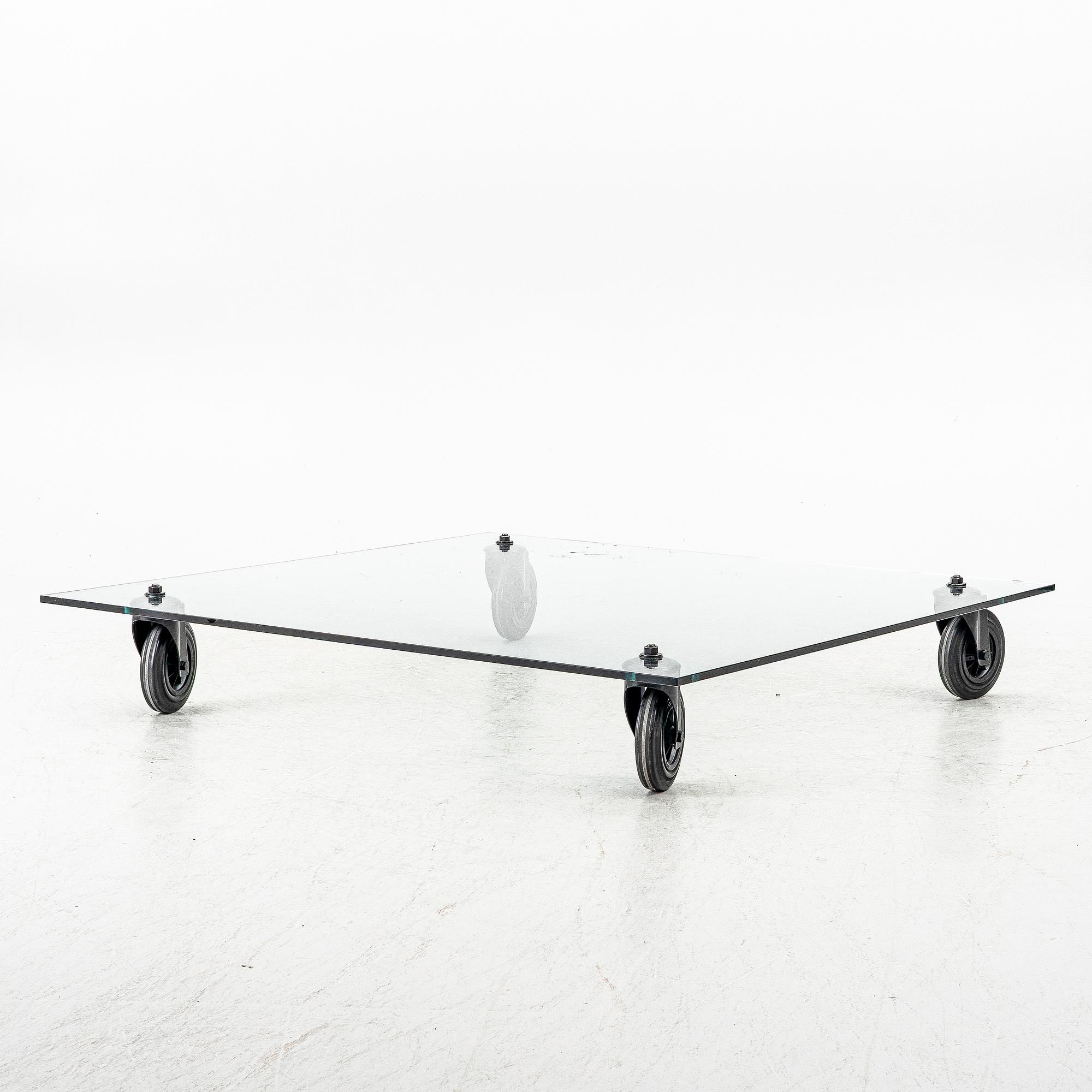 Gae Aulenti, Coffee table, “Tavolo con Ruote”, Fontana Arte, Italy, late 20th/early 21st century.