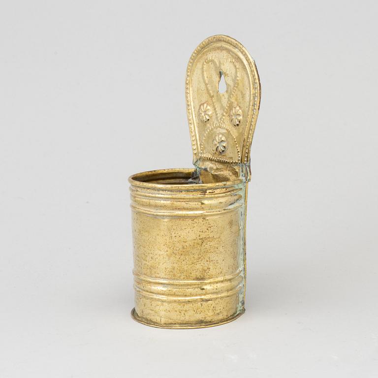 A 18th/19th century brass spoon holder.