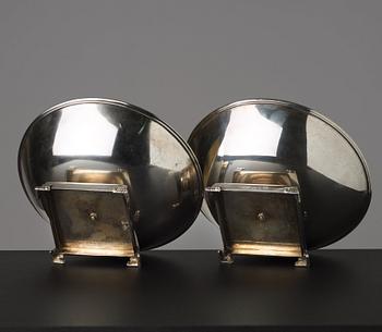 A pair of Swedish 20th century parcel-gilt silver bowls, maker's mark of CG Hallberg, Stockholm 1934 and 1935.