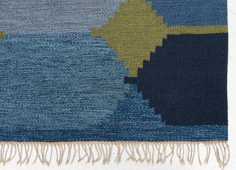 A flat weave carpet, c. 252 x 153 cm signed BS.