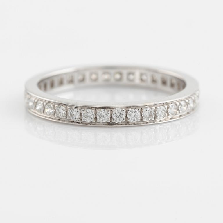 Brilliant cut diamond eternity ring.