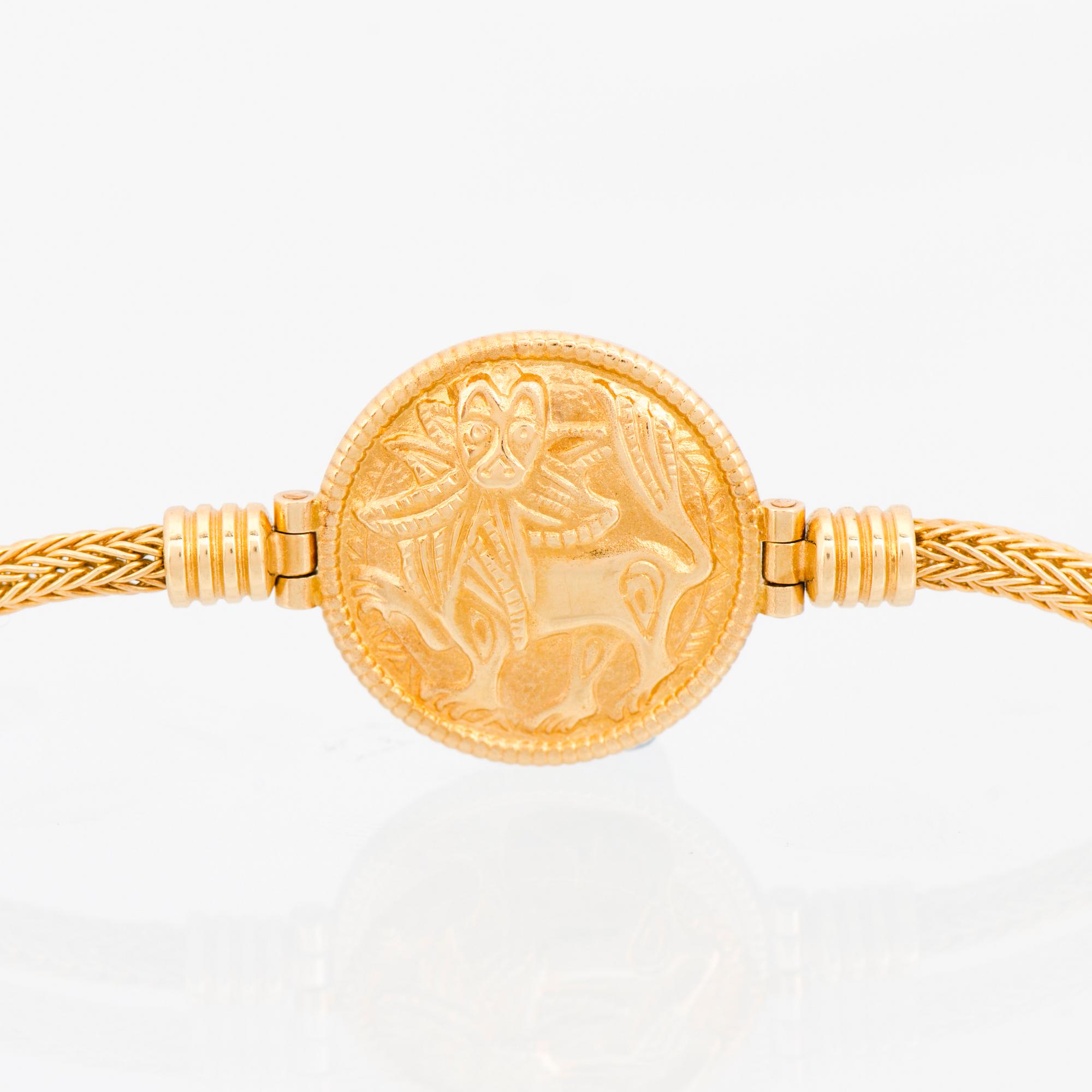 ARMBAND, "Sollejonet", 18K guld. Kalevala Koru 1999.