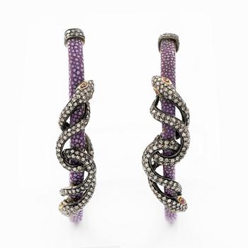 A pair of earrings in the shape of a snake, leather, mother-of-pearl and silver, with  diamonds in various cuts.