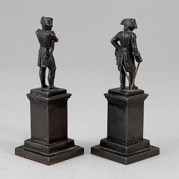FIGURER, två stycken, gjutjärn, Empire, 1800-talets första hälft.