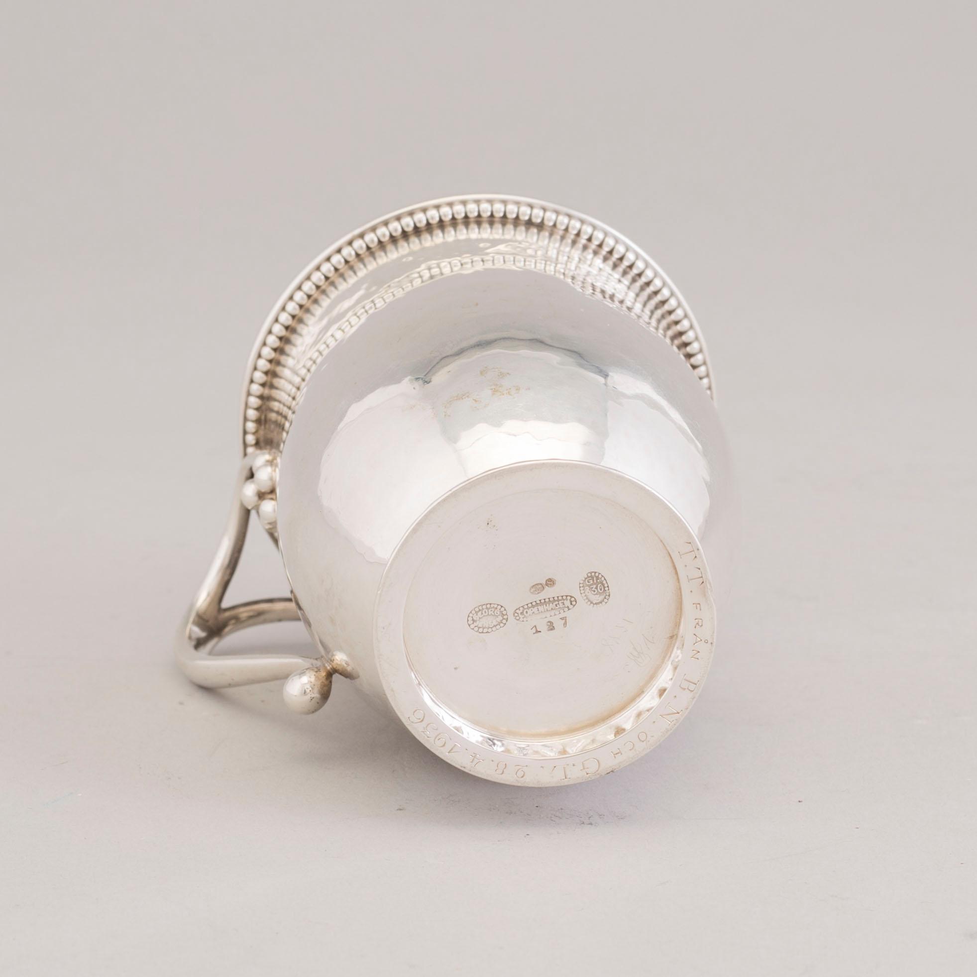 A silver mug by Georg Jensen, model 127, Copenhagen 1920/30's.