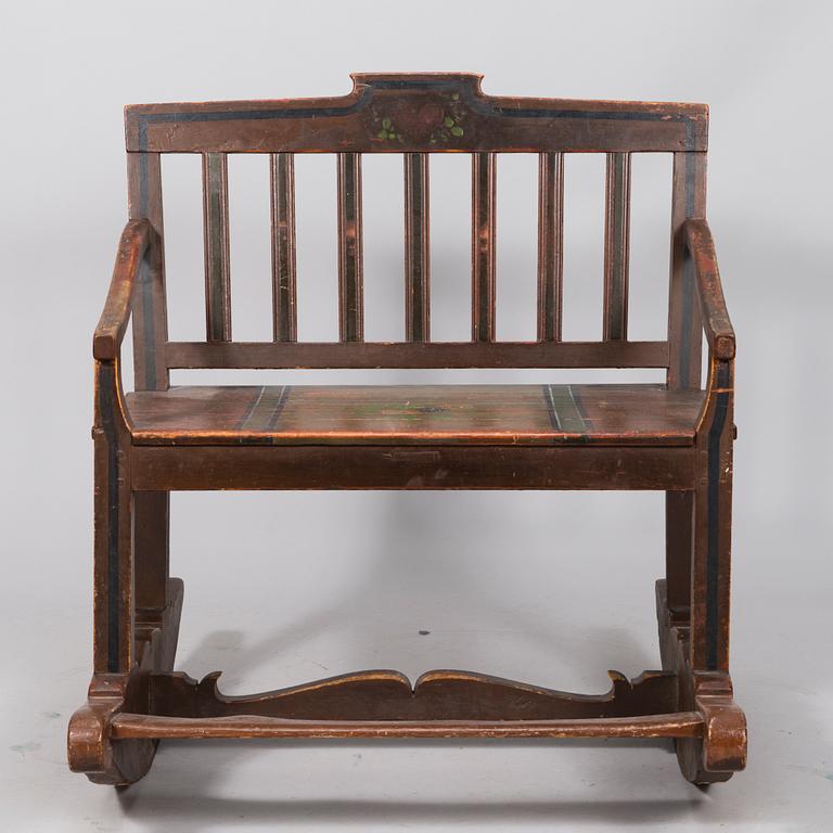 A 19th century wooden rocking chair.