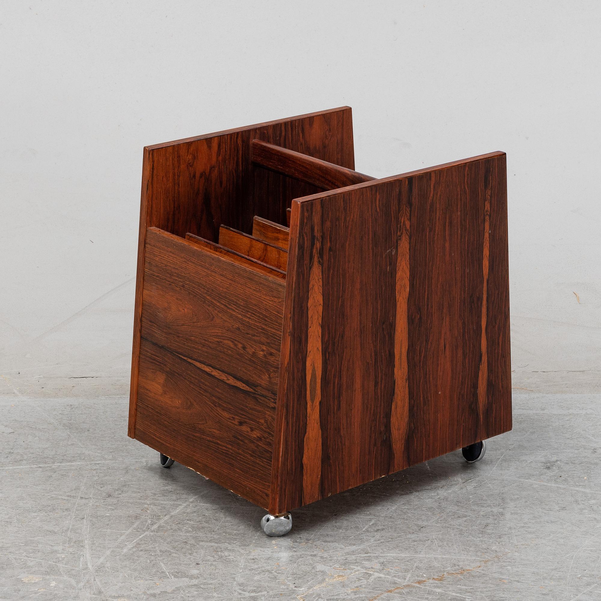 Rolf Hesland, a rosewood newspaper stand, Mellemstrands Trevareindustri, Bruksbo, Norway, 1960's/70's.