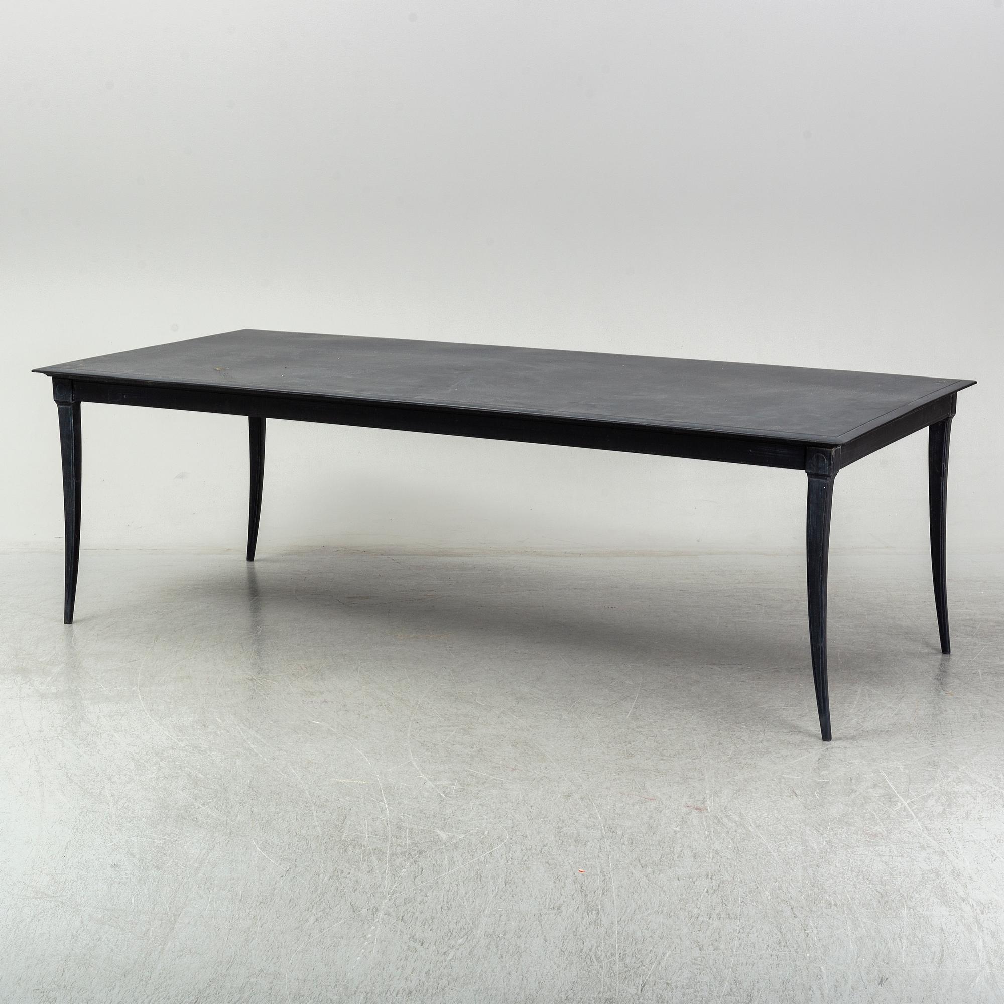 A metal Restoration Hardwood table, 21st Century.