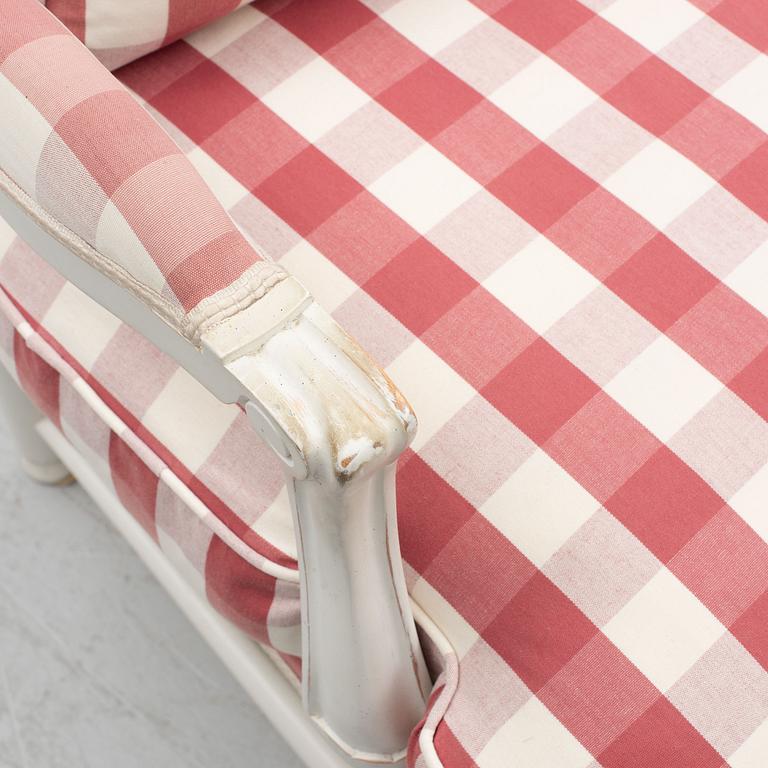 A pair of armchairs a pair, so-called Gripsholm chairs, Gustavian style, 20th century.