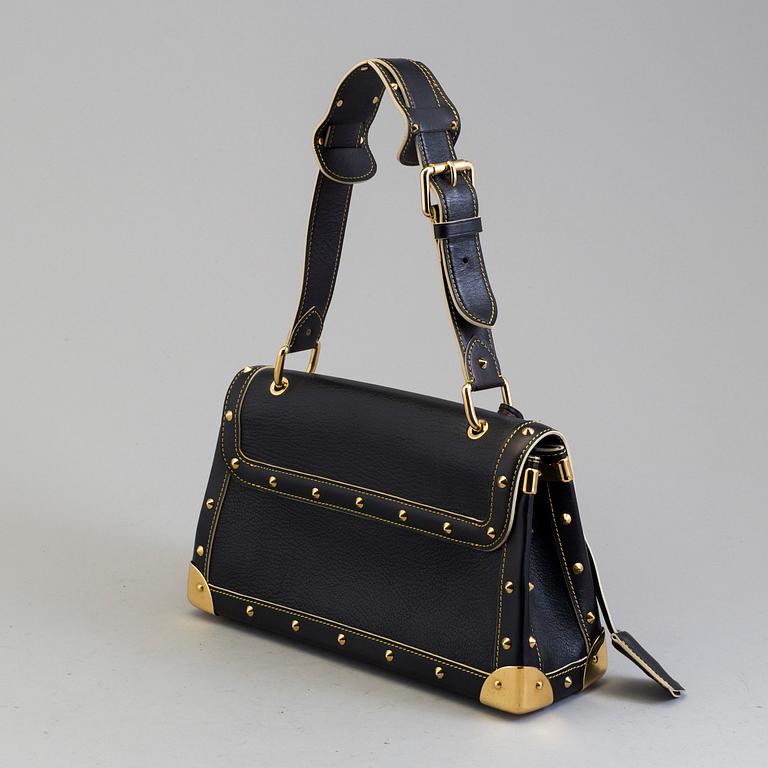 LOUIS VUITTON, a studded leather hand bag.