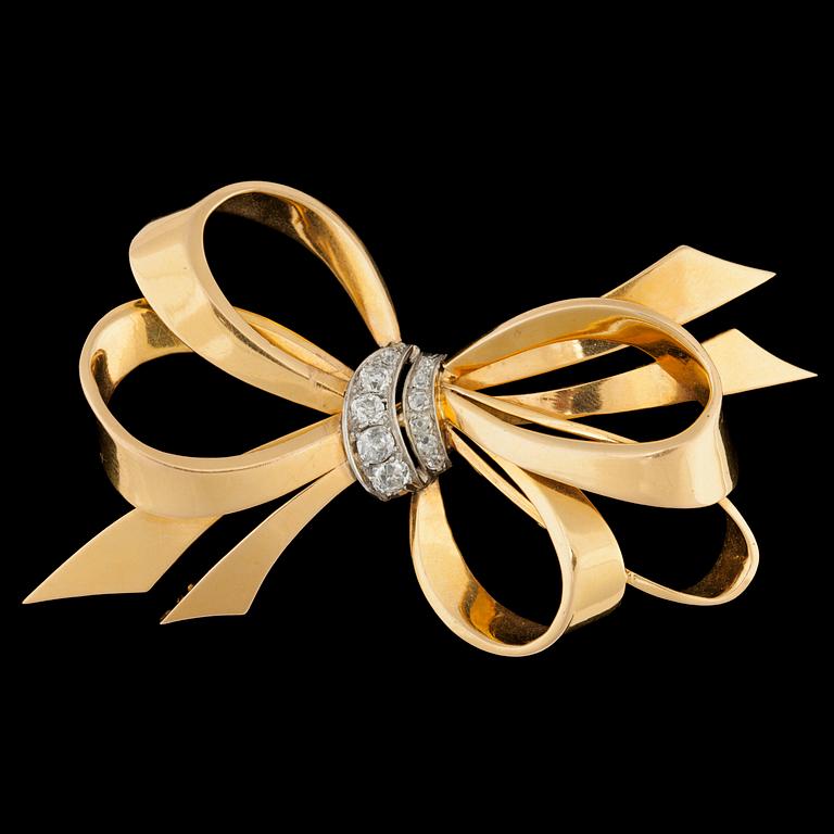 A Cartier gold and brilliant cut diamond brooch, 1940's.