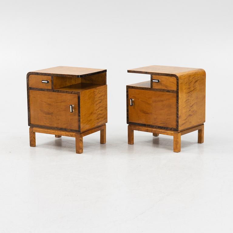 A pair of birch veneered 1930's bedside tables.