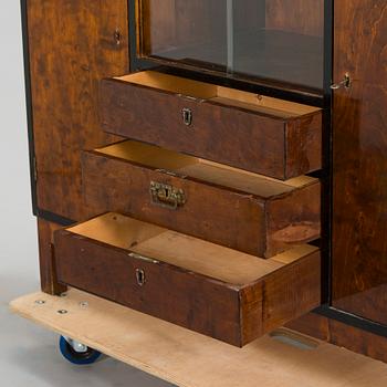 A 1930s functionalist style cabinet.