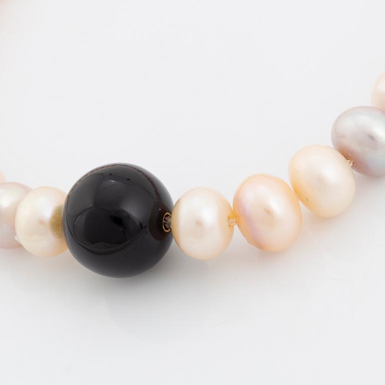 A cultured fresh water pearl necklace.