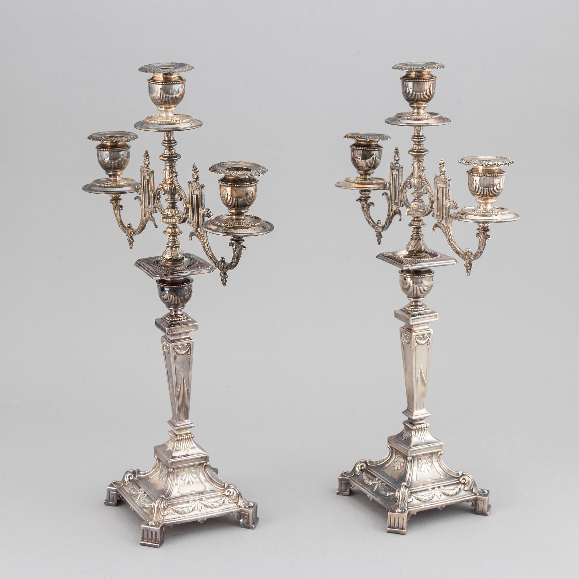 A pair of silver plated candelabras, early 20th century.