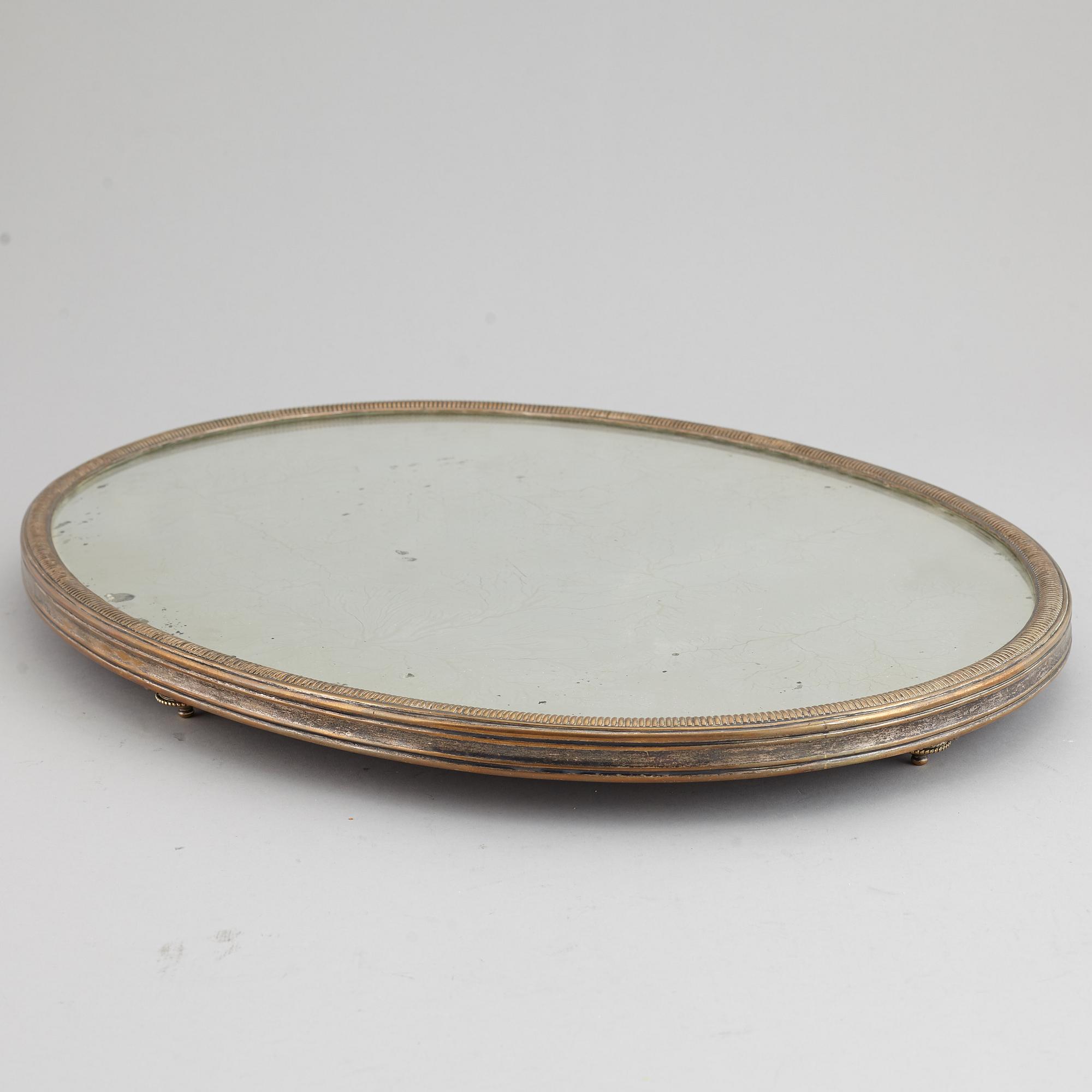 A argent hache table top, England, circa 1900.