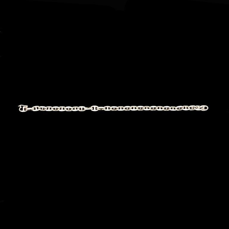 A sterling silver bracelet by Hermès.