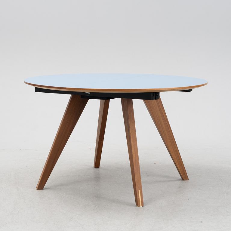 A 'New Mood' dining table by Michel H Nielsen for Bolia.