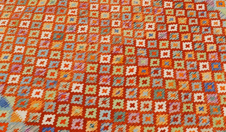 A carpet, kilim, ca 250 x 170 cm.